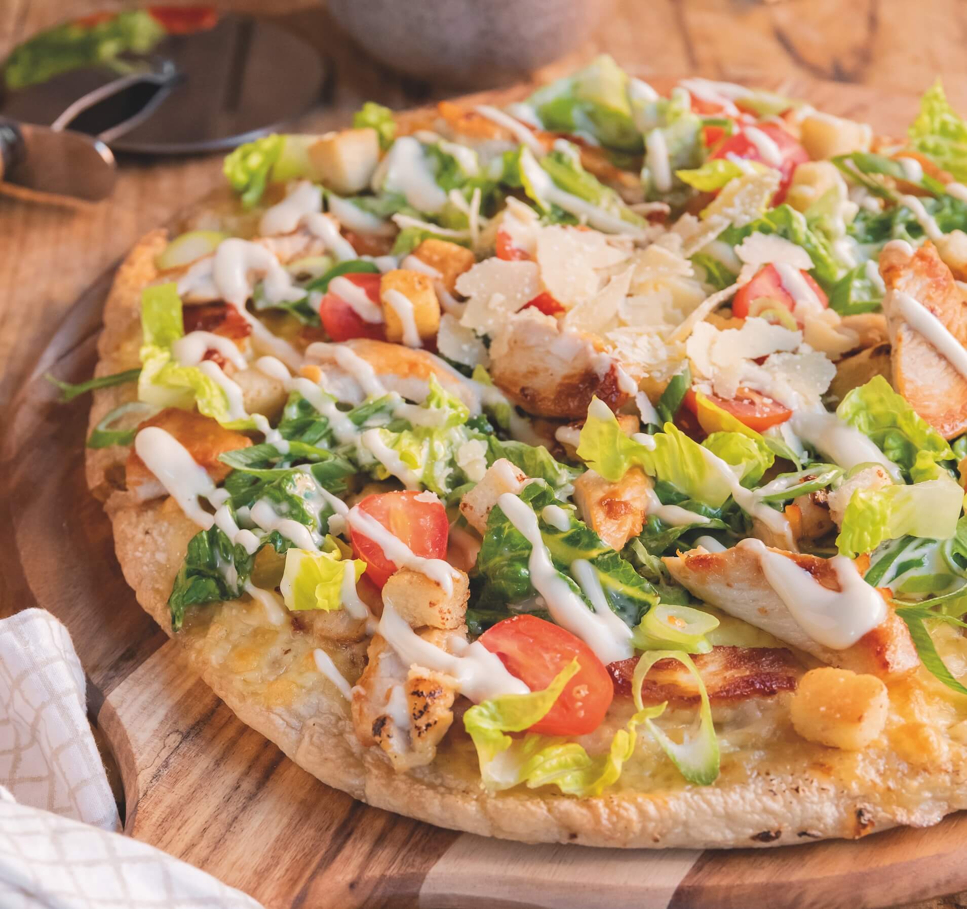 Discover the Irresistible Caesar Pizza: A Perfect Delight for Food Lovers at The Monroe Hotels