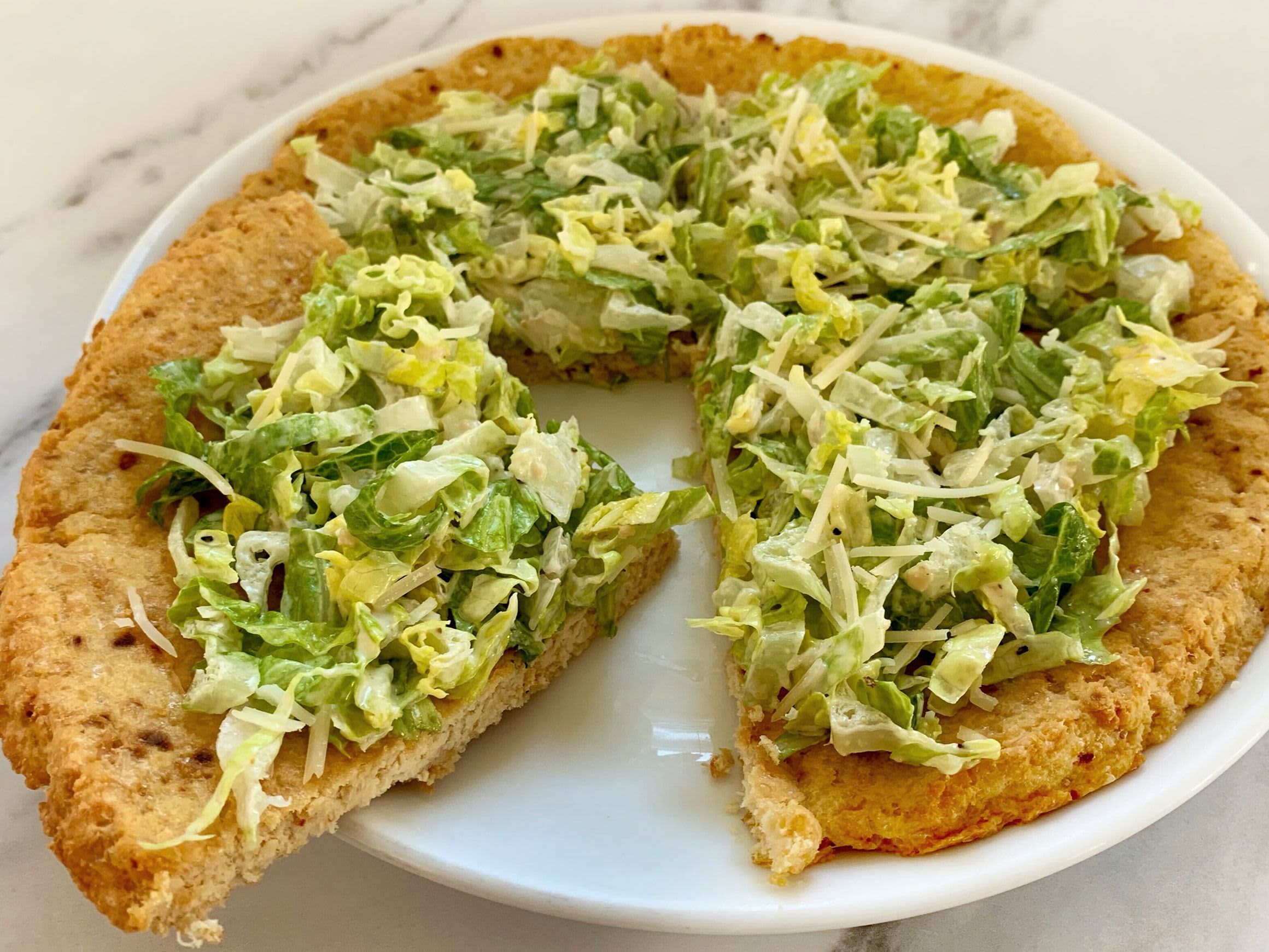 Discover the Irresistible Caesar Pizza: A Perfect Delight for Food Lovers at The Monroe Hotels