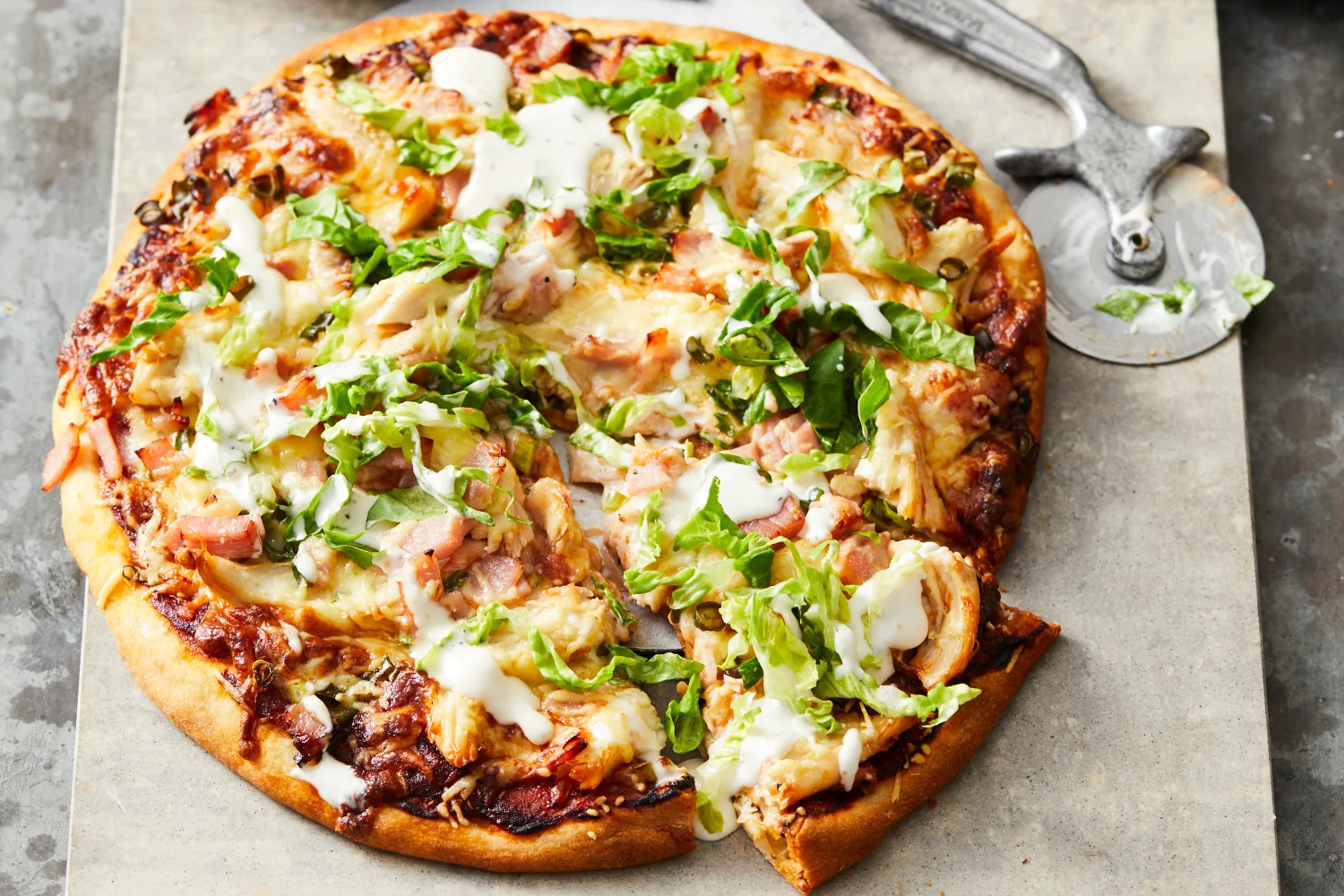Discover the Irresistible Caesar Pizza: A Perfect Delight for Food Lovers at The Monroe Hotels