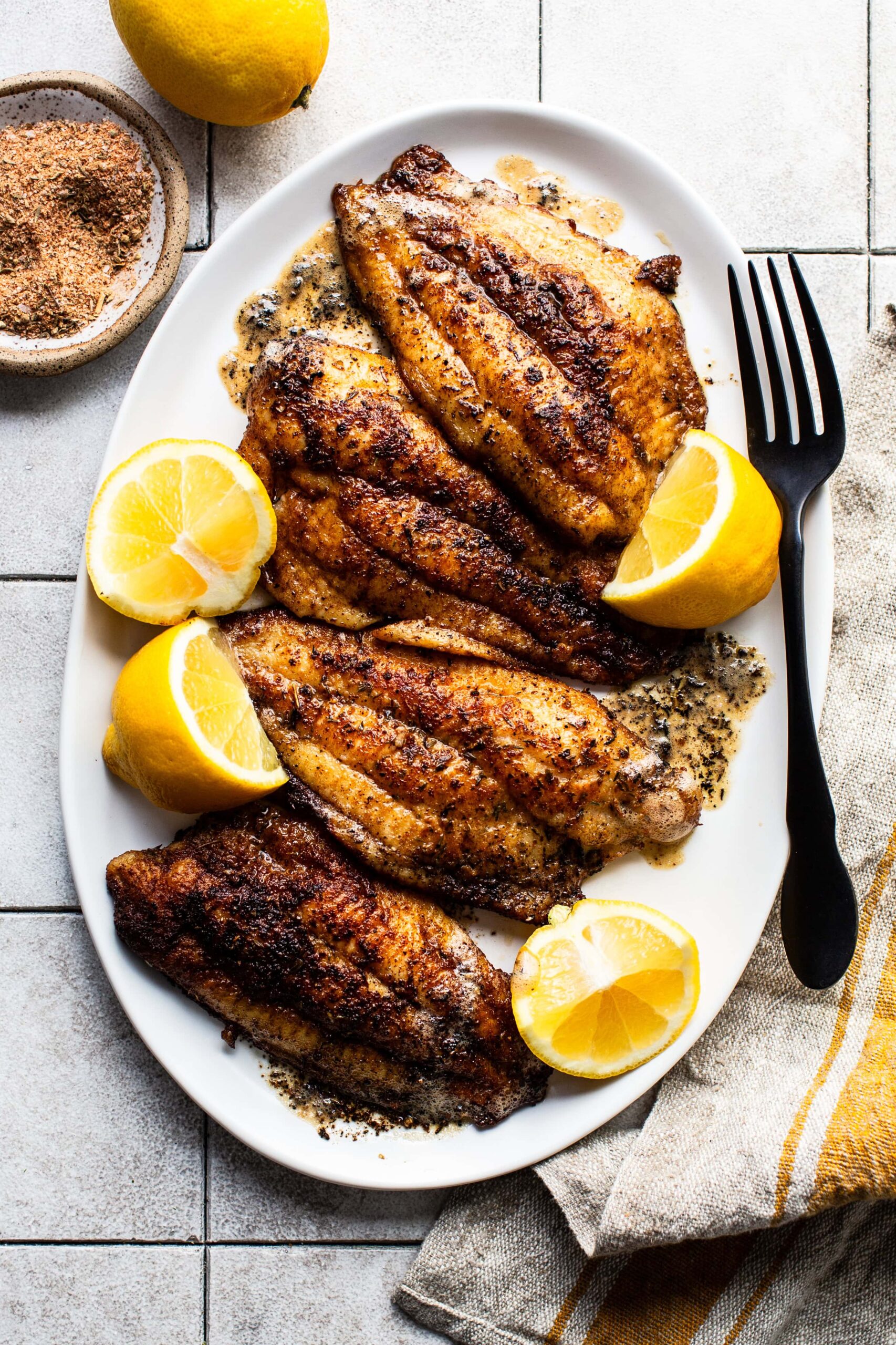 Discover the Irresistible Delight of Blackened Catfish at The Monroe Hotels