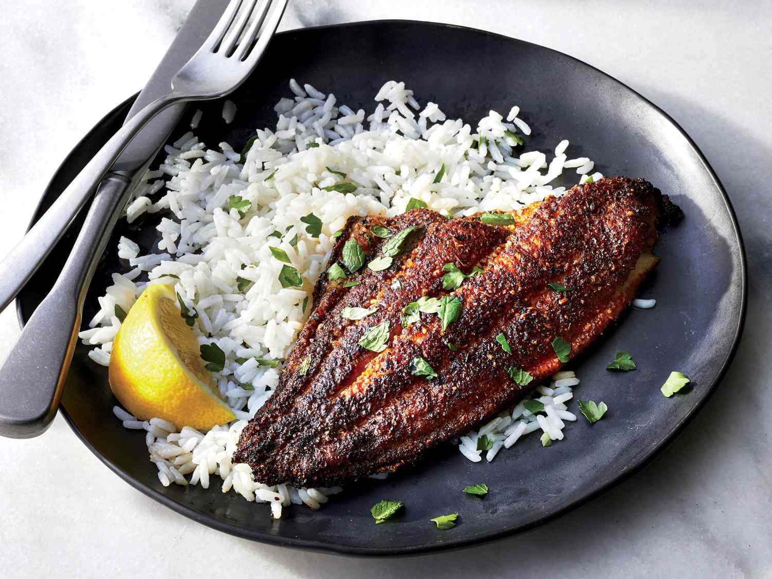 Discover the Irresistible Delight of Blackened Catfish at The Monroe Hotels