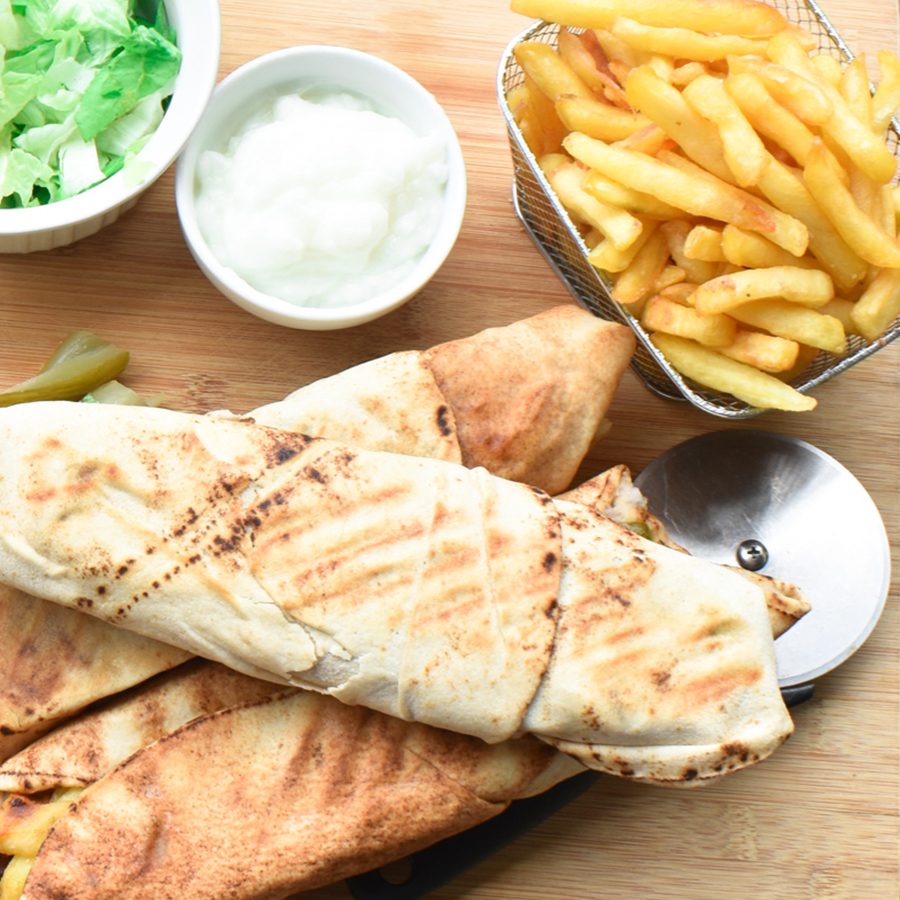 Discover the Magic of Chicken Shawarma: A Must-Try Dish at The Monroe Hotels