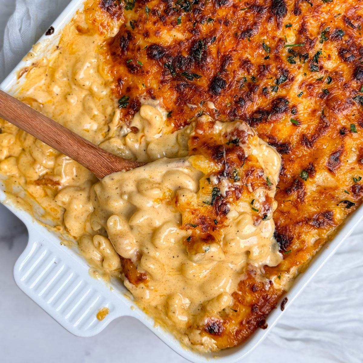 Discover the Ultimate Comfort Food: Baked Macaroni and Cheese – A Must-Try Dish at The Monroe Hotels