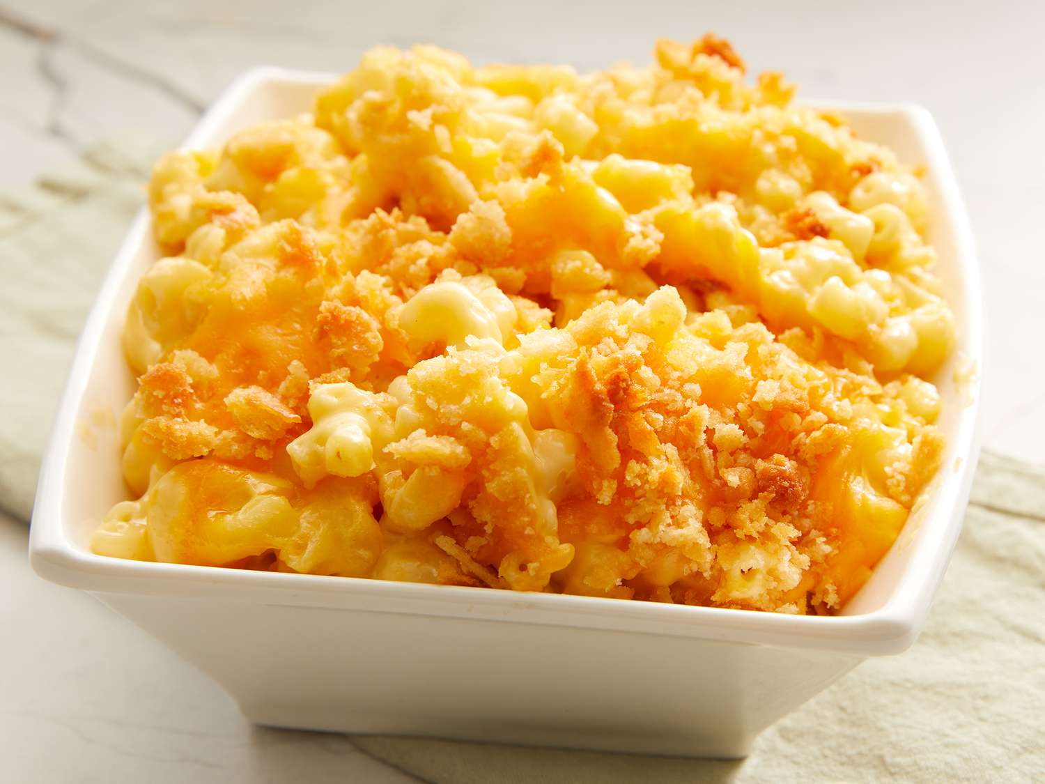 Discover the Ultimate Comfort Food: Baked Macaroni and Cheese – A Must-Try Dish at The Monroe Hotels