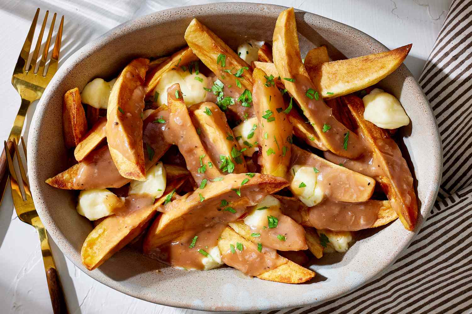 Poutine: The Ultimate Comfort Food You Need to Try – Discover it with The Monroe Hotels