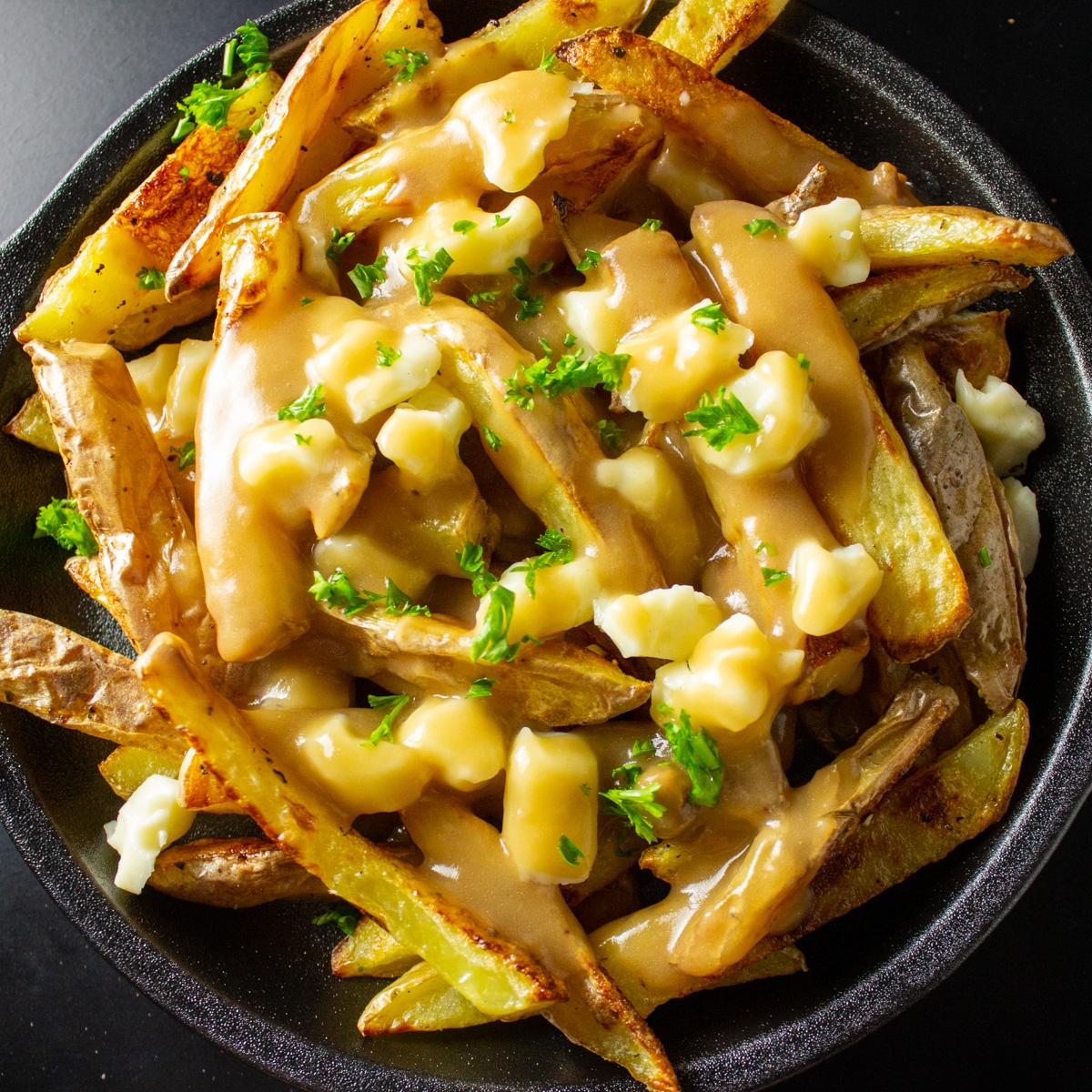 Poutine: The Ultimate Comfort Food You Need to Try – Discover it with The Monroe Hotels