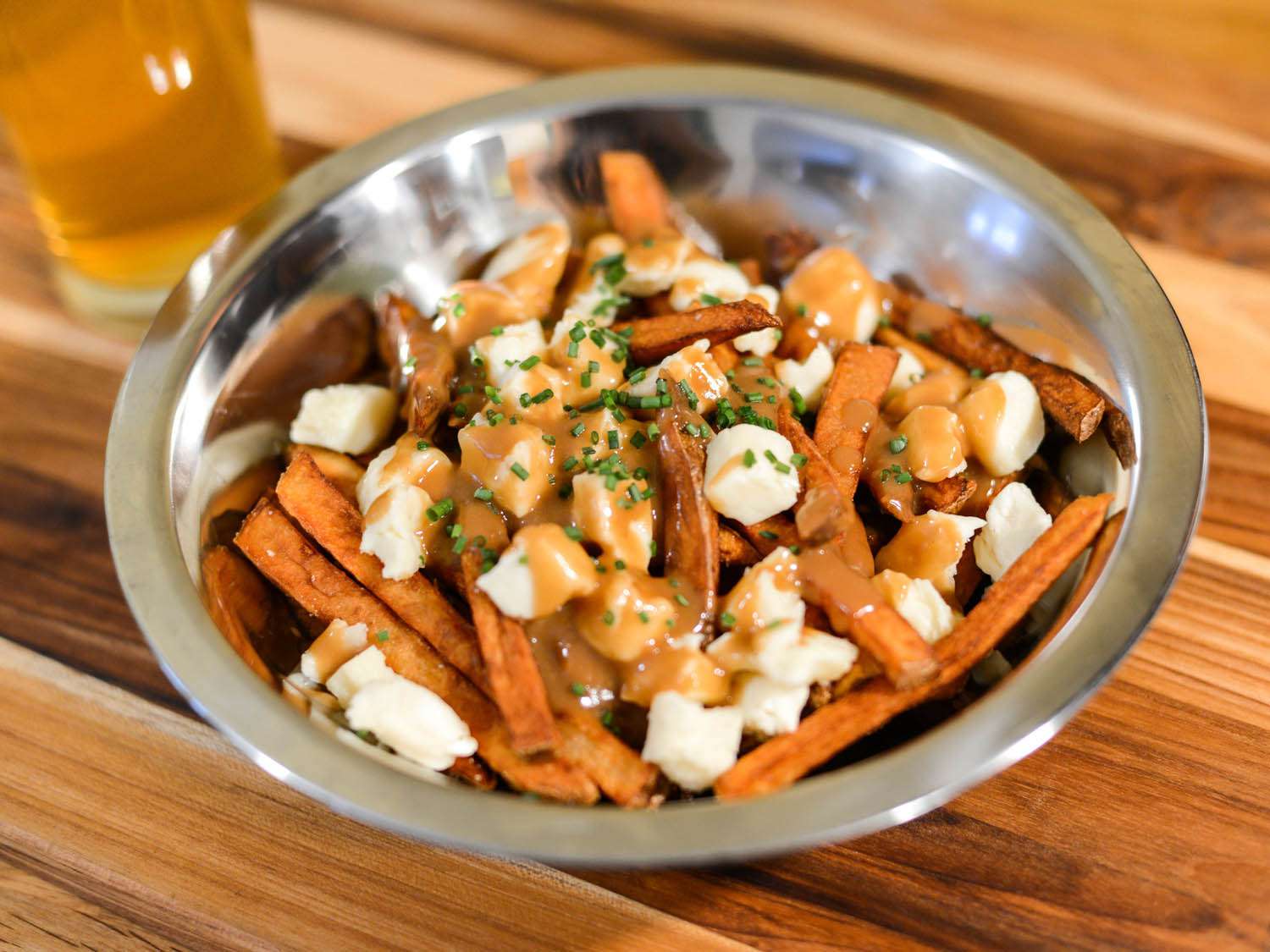 Poutine: The Ultimate Comfort Food You Need to Try – Discover it with The Monroe Hotels