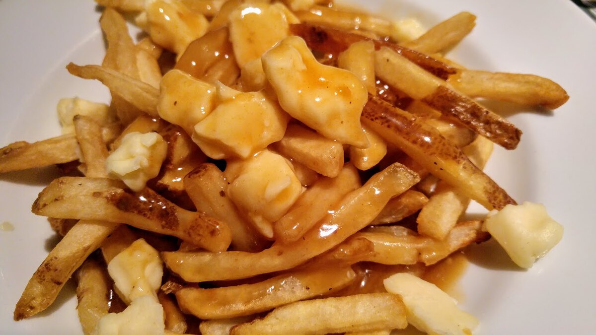 Poutine: The Ultimate Comfort Food You Need to Try – Discover it with The Monroe Hotels
